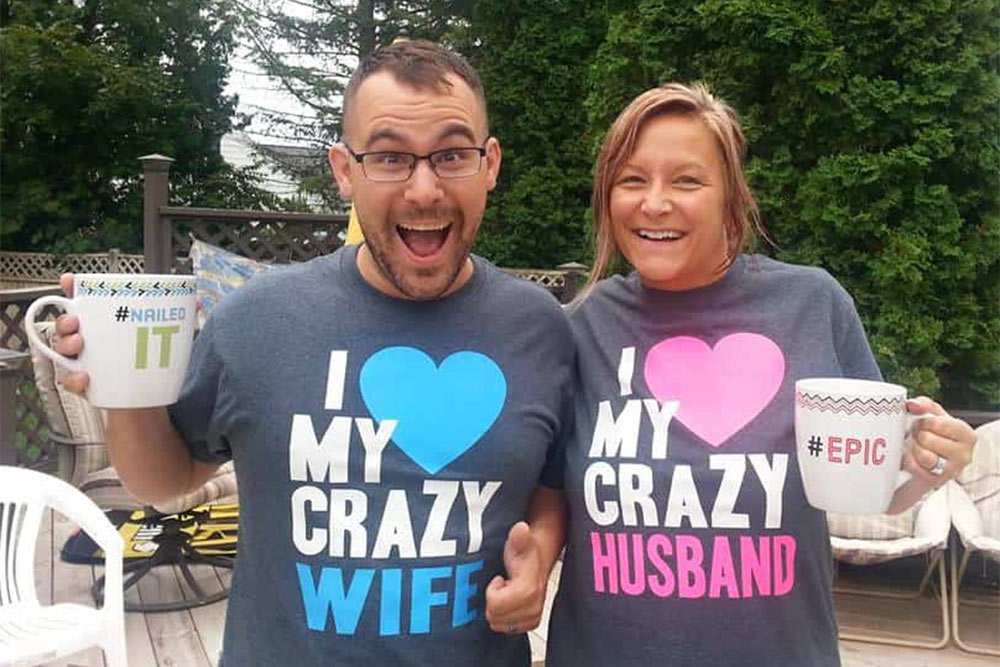 man and woman with custom apparel and drinkware